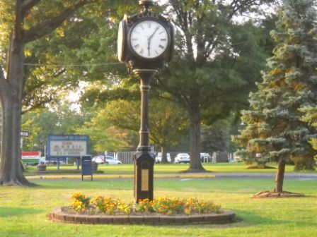 Town Clock in Clark surrounded by a well-kept lawn